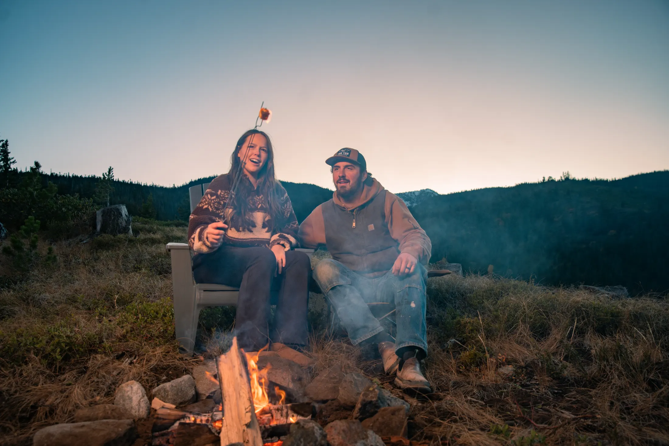 Family settling in around the campfire