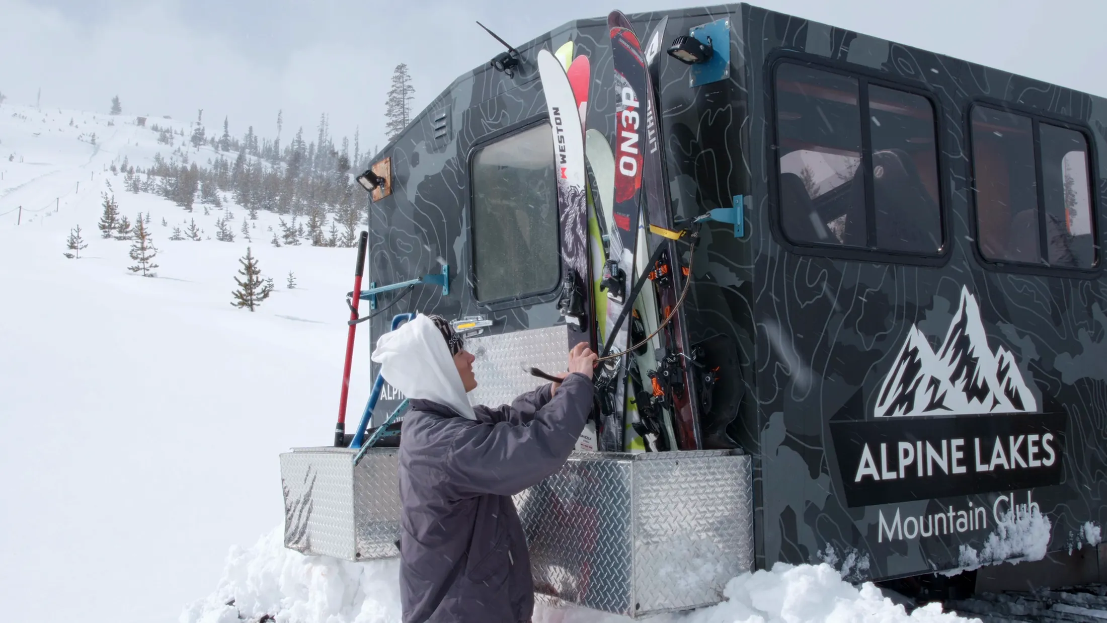 Loading skis onto the Alpine Lakes snowcat